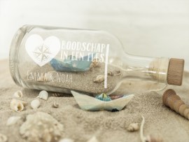 Gegraveerde fles met tekst