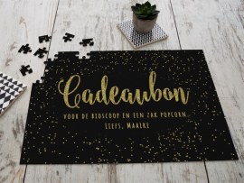 Cadeubon op een puzzel for valentinsdag